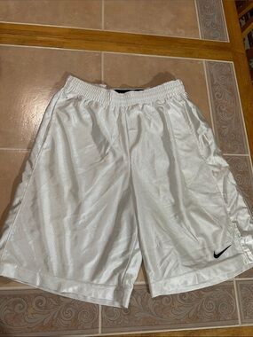 VTG Men’s Y2K Nike White Basketball Shorts with Orange Swoosh Detail